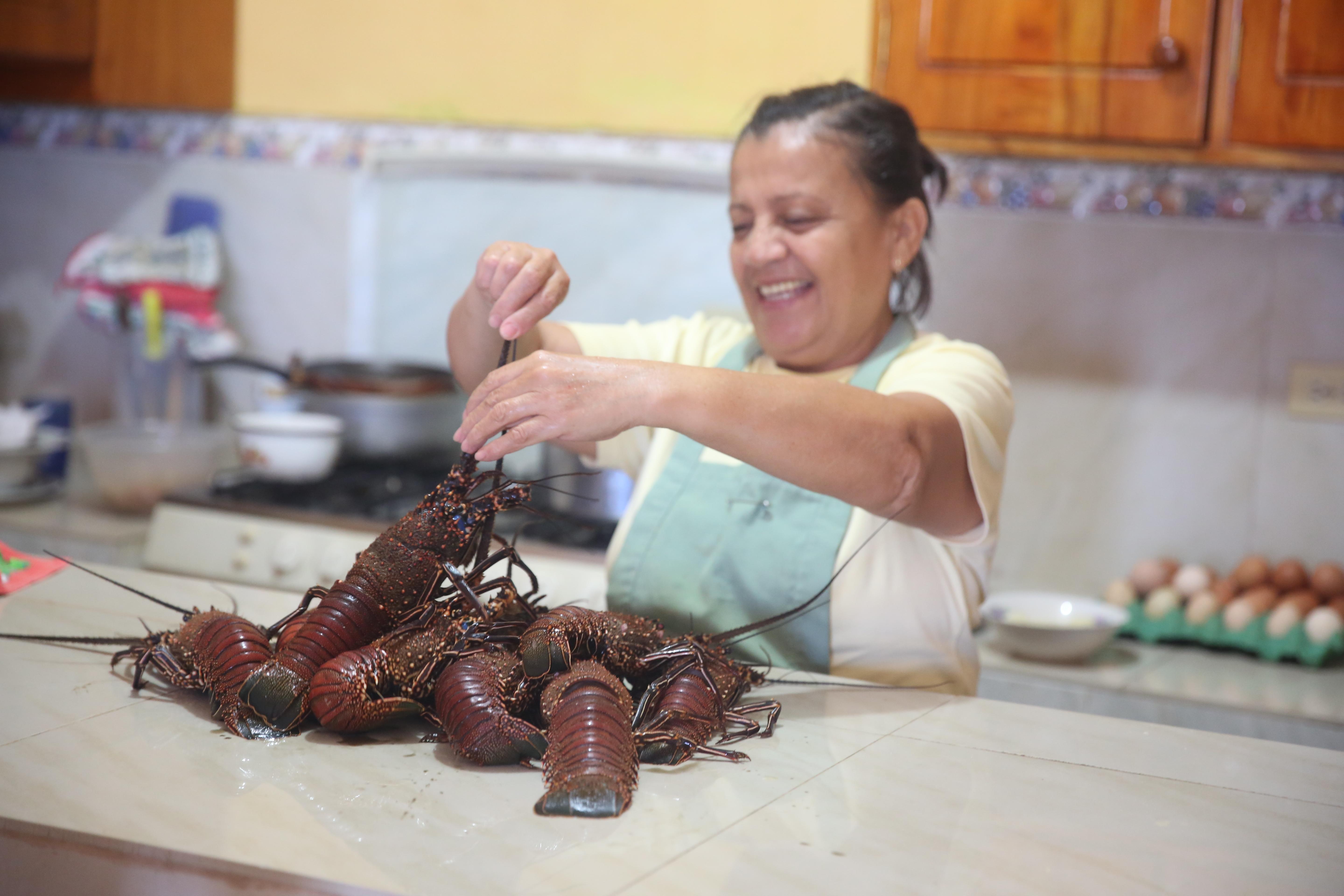 While studying Spanish in Ecuador with Projects Abroad, students live with local host families who prepare delicious meals. A host mom prepares a meal for her students who live with her while they learn Spanish in Ecuador.